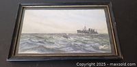 Full view of framed seascape painting