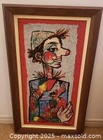 Full view of framed clown portrait painting