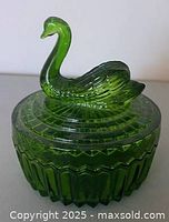 complete jar with lid showing swan finial