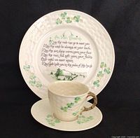 Front view of plate, cup and saucer