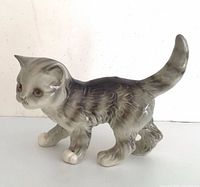 Left side view of grey Goebel kitten figurine