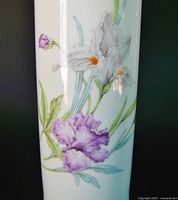 Front view showing iris decoration and vase shape