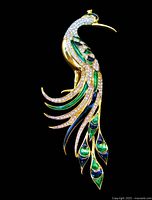 Front view showing full peacock design, enamel colors and rhinestones
