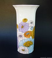 Front view showing floral design and flared rim