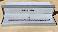 Bracelet in open MMCrystal box, close view of stones and silver settings