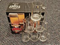 Original Libbey Brew Masters box beside stacked clear glass beer mugs