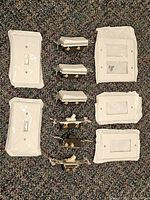 Front view showing sealed toggle and decorator wall plates with switches