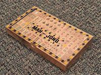 Top view of raintree wood mahjong case showing printed clear lid and tile graphics