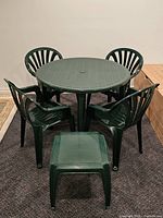Complete patio set: round table, four chairs, square stool