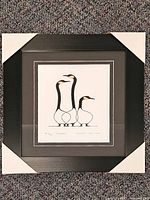 Front view of framed limited edition print with corner protectors, showing artwork and matting