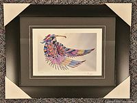 Front view of framed limited edition print with mats and protective corners