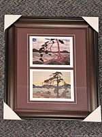 Front view showing two prints inside frame