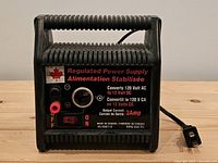 Front view showing ratings, switch, fuse, terminals