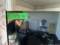 Front view of 40-inch onn. Roku TV on table