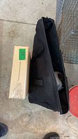 Boxed Tacklife nailer beside black soft bag likely containing Pro Point nailer
