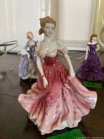 Front view of Royal Doulton Stephanie figurine in pink floral gown
