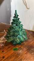 Entire ceramic Christmas tree front view with cord and peg bag
