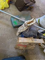 Group of items including marine pump and tackle box