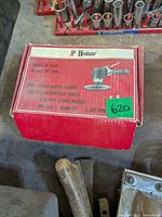 Sealed red Herbrand box with model information