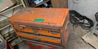 Front and top view of orange Herbrand 6-drawer steel tool chest showing overall wear