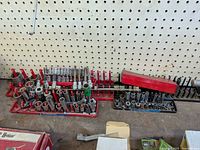 Full view of sockets on three organizers and red case