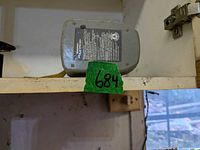 Battery end of Mastercraft Maximum impact wrench on shelf