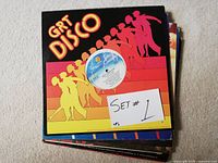 Stack topped by GRT Disco album showing note "Set #1"