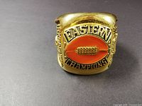 Top view showing EASTERN CHAMPIONS text and orange football inset