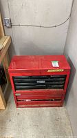 Front view of red DIY Mark tool chest showing overall condition
