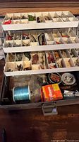 overall view of open tackle box showing trays and contents