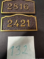 Both plaques 2816 and 2421 front view