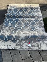 Full view of rug showing pattern and dimensions reference