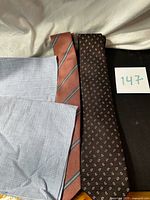 Overall lot: two neckties and two pocket squares