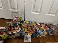 Full lot showing two clear bags: one with holiday die-cuts, one with miniature grocery boxes