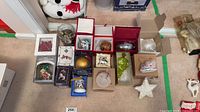Group shot of all boxed ornaments arranged on carpet