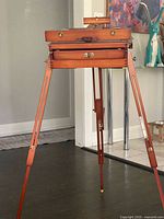 Easel standing with legs extended, drawer visible