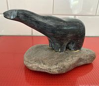 Left side view of soapstone bear on base