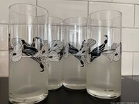 Four Cerve highball glasses showing design and frosted finish