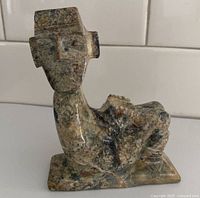 Front angled view of full marble Chacmool statue