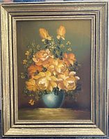 Front view of framed floral oil painting