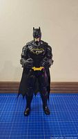 Front view of 12-inch Batman action figure standing upright