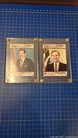 Front of both Desert Storm cards in acrylic holders