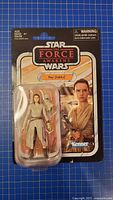 Front view of sealed Rey (Jakku) figure on card
