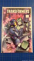 Front cover of bagged and boarded Transformers comic