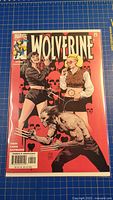 Front view of bagged Wolverine #160 comic showing full cover art and condition