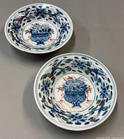 Top view showing both bowls and painted decoration