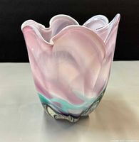 Front view showing ruffled rim and color pattern