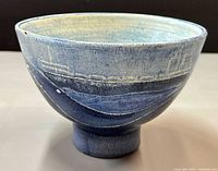 Full view of signed Harlander blue pedestal bowl