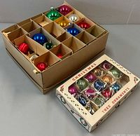 Two boxes of assorted vintage glass ornaments