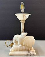 Full view lamp unlit showing stone construction and wiring